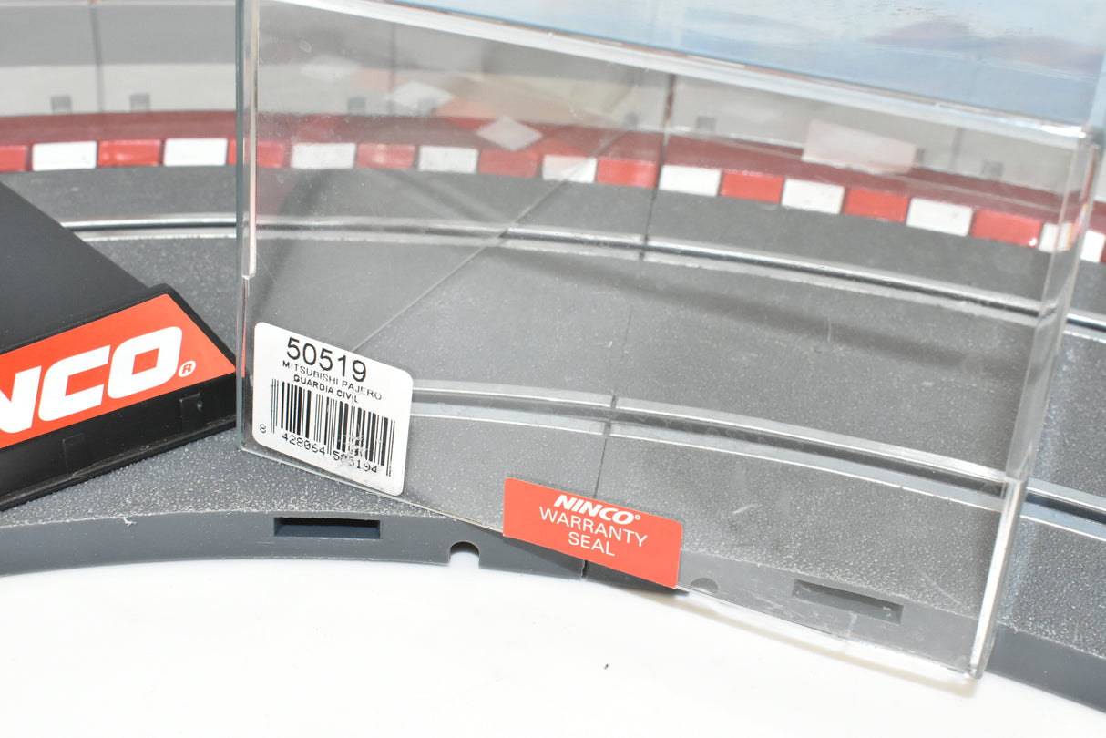 Slot car track section with 50519 label and warranty seal for ZZ Expired Kim Collection