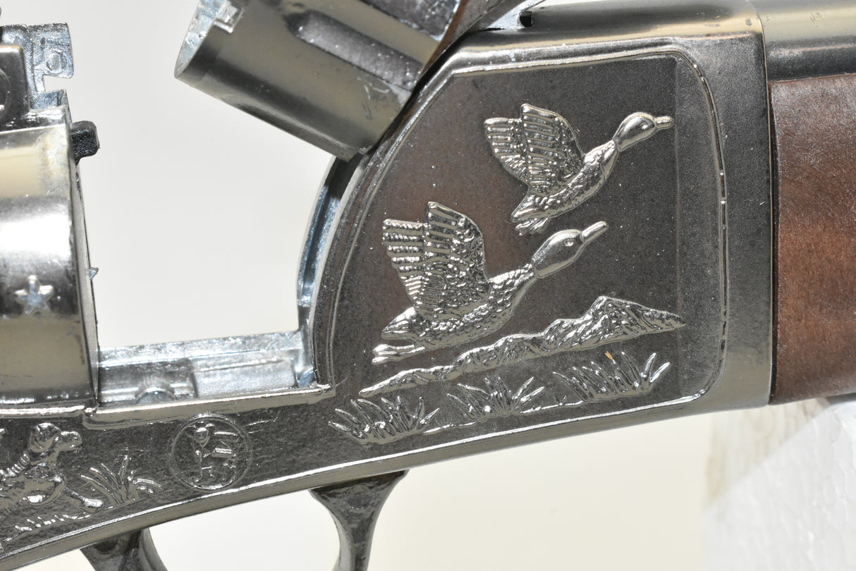 Engraved ducks in flight on a metal toy rifle mechanism for 4732 4732C