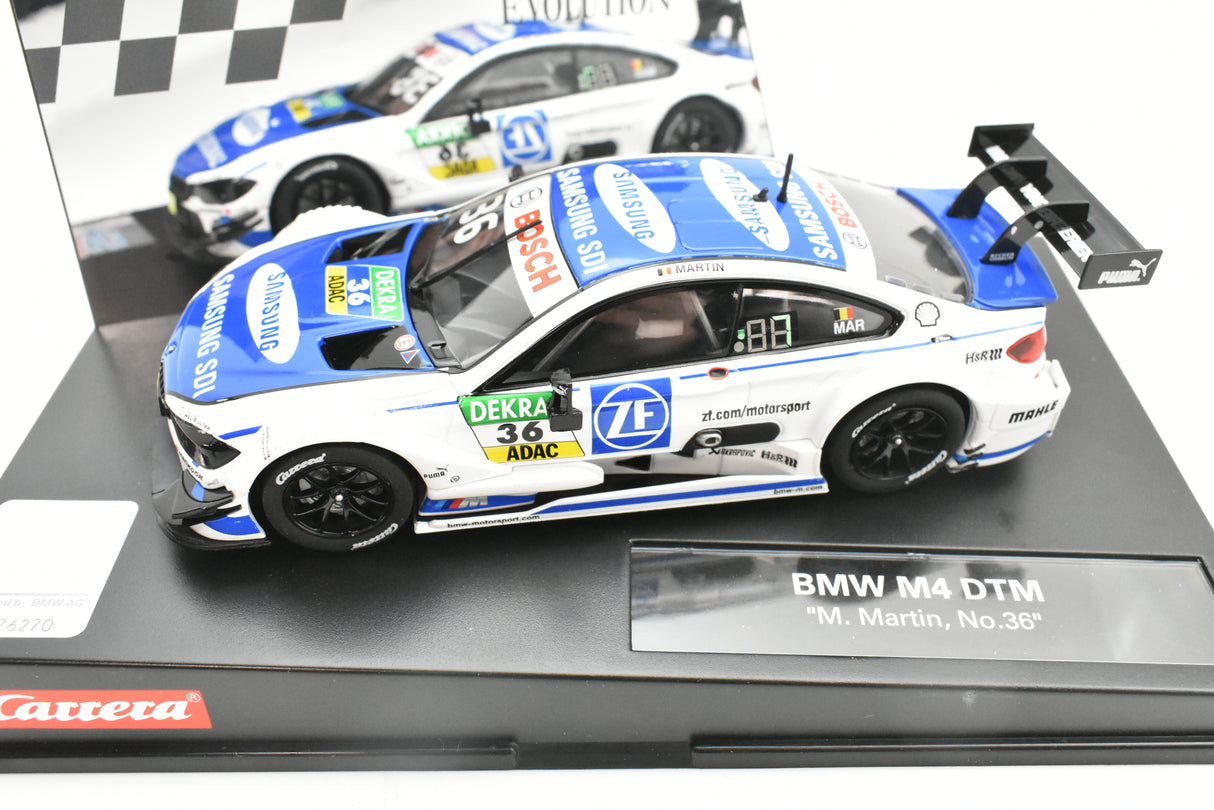 Slot car of a BMW M4 DTM race car, "M. Martin, No. 36." for Carrera Evolution 27571