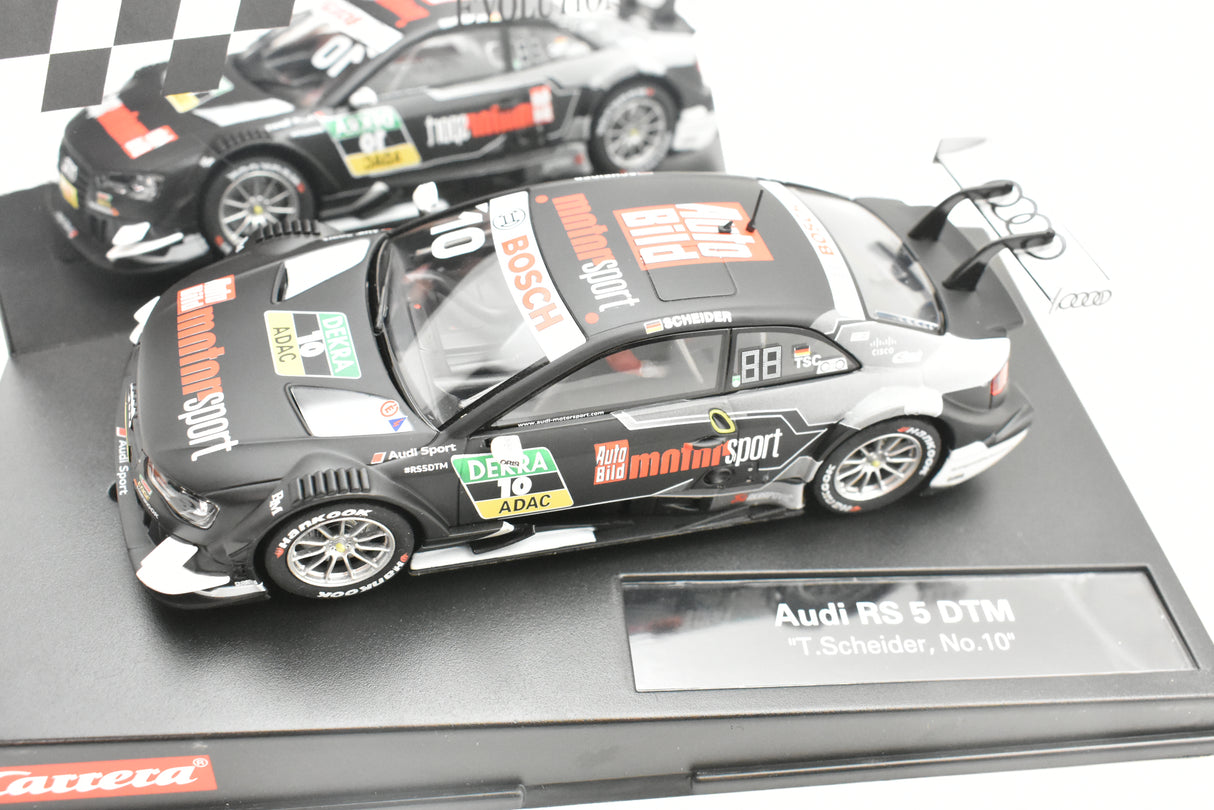 Slot car of an Audi RS 5 DTM race car, T.Scheider, No. 10 for Carrera 27542, front view