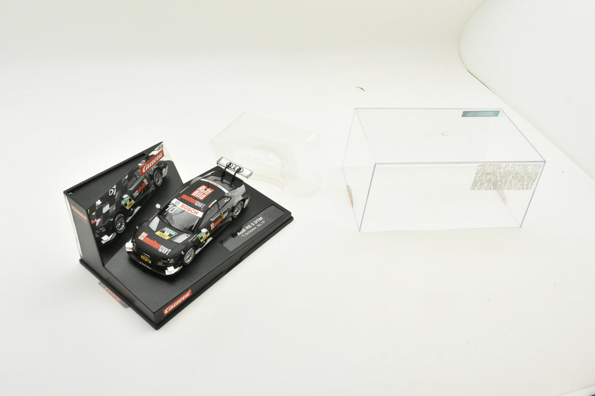 Slot car of Audi RS 5 DTM race car in its box for Carrera 27542