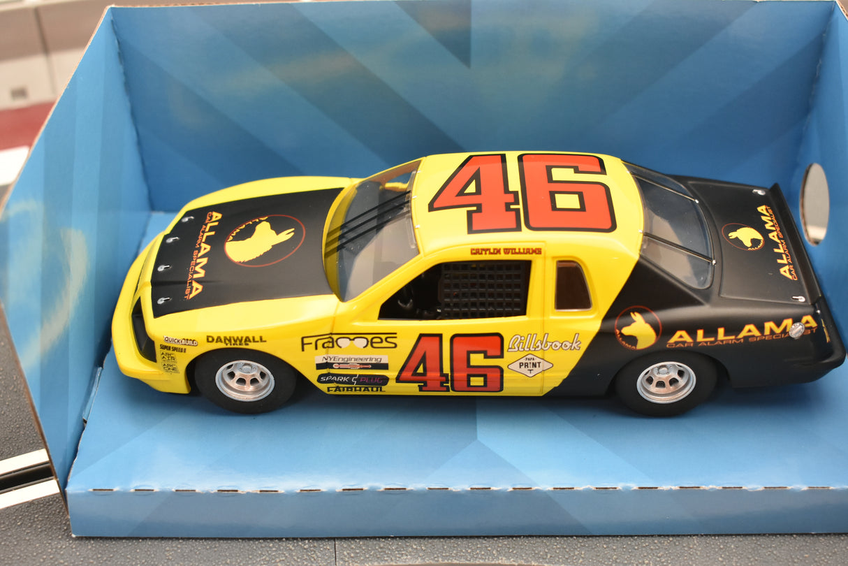 Yellow and black race car model with "ALLAMA" and "46" markings for Scalextric C4088