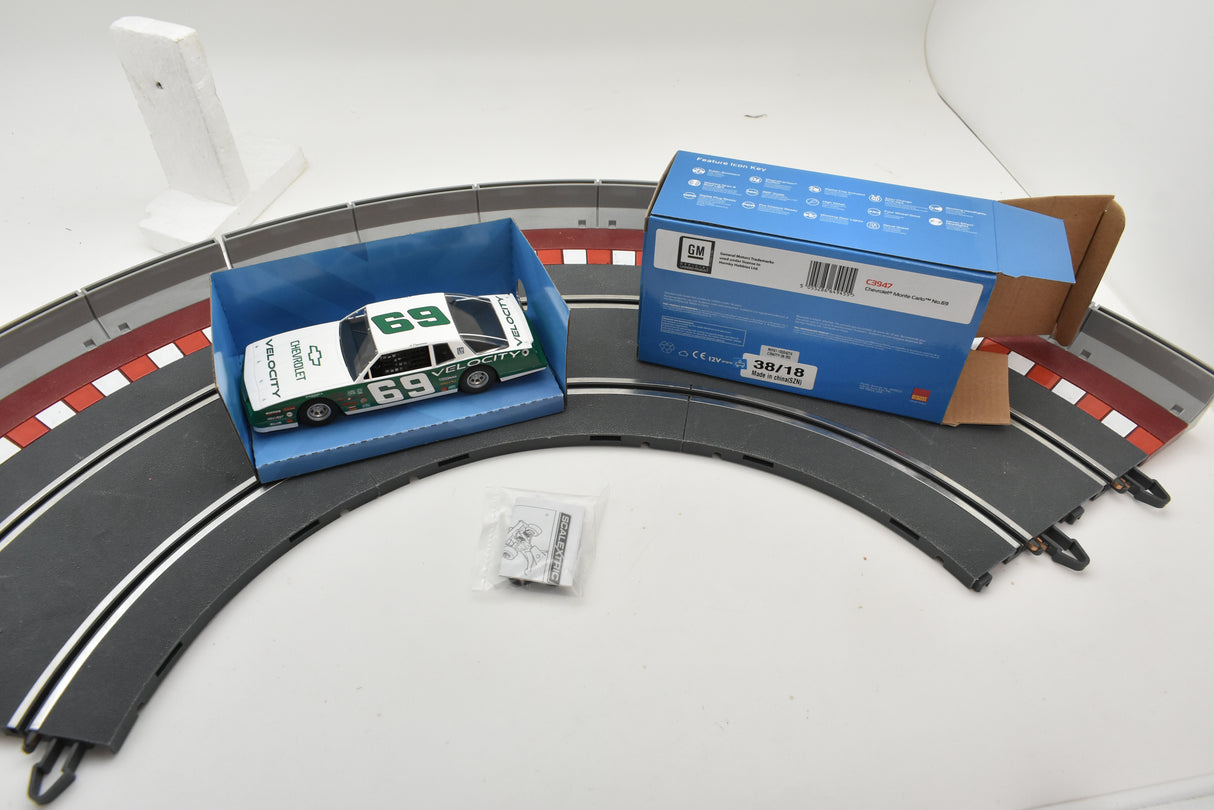 Slot car on track with box and accessories for Scalextric C3947