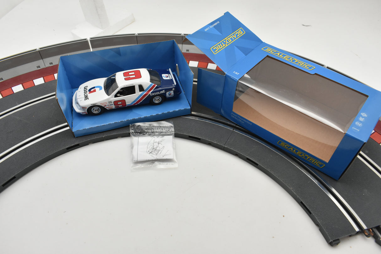 White Ford Thunderbird race car in its open box with track section for Scalextric C4035