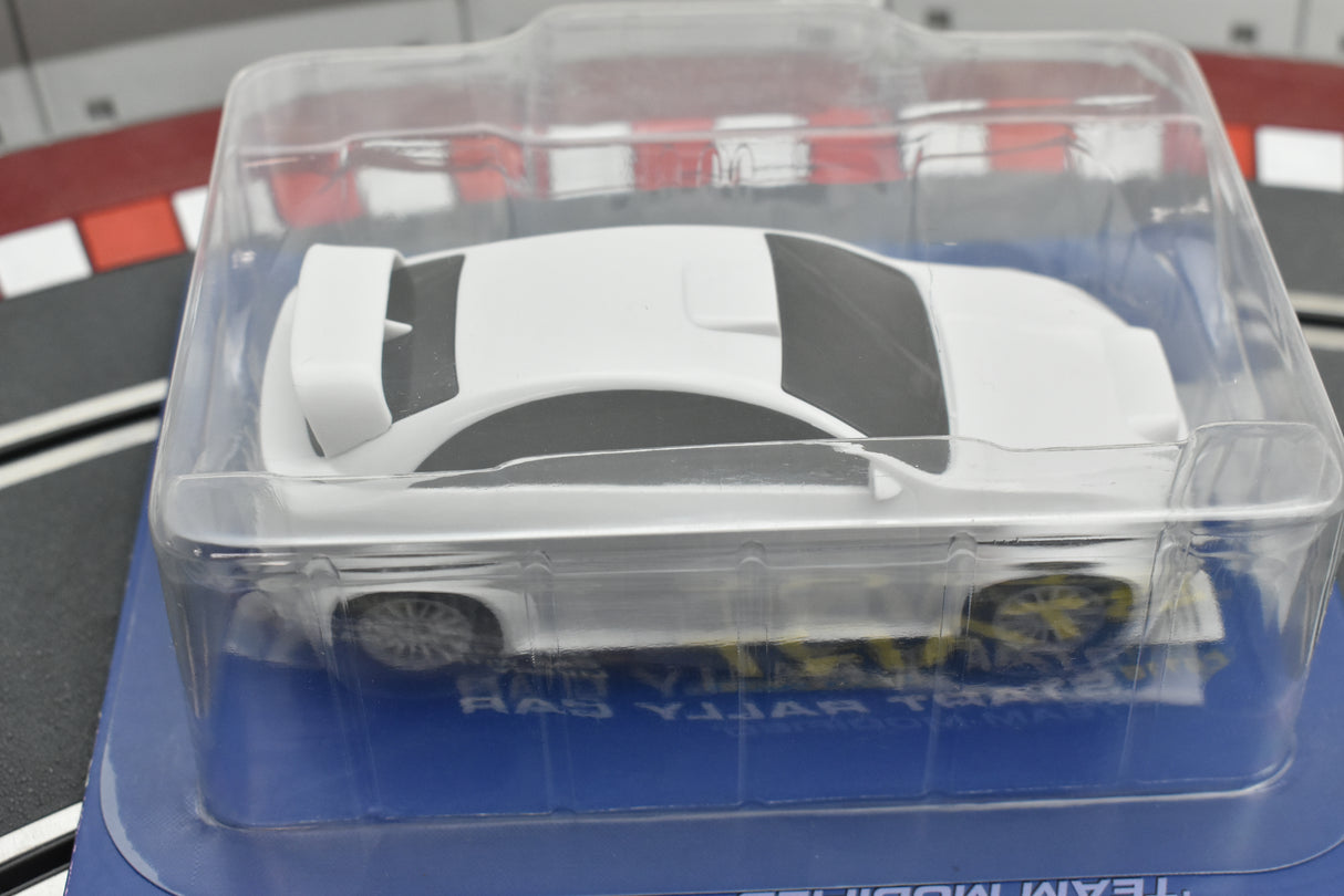 White and black rally car in clear plastic display case for Scalextric C4116