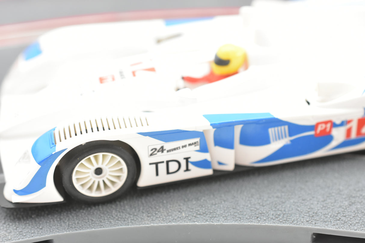 White slot car replica of an Audi R10 TDI race car for SCX A10300X3U0