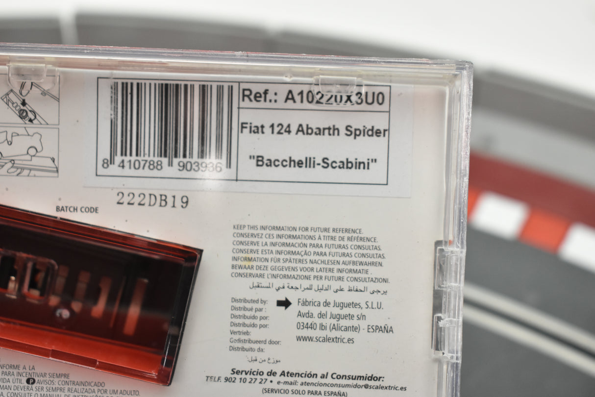 Car box showing Fiat 124 Abarth Spider model details for SCX A10220X3U0