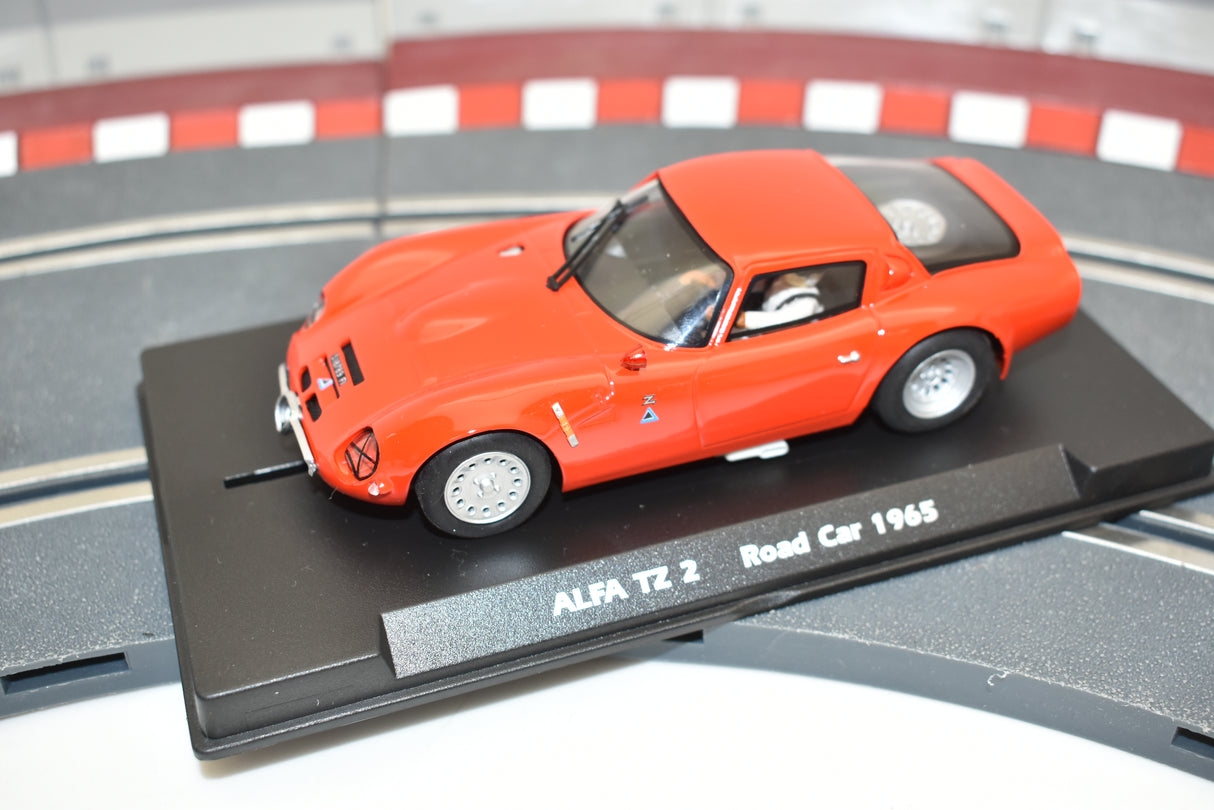 Red slot car, Alfa TZ 2, displayed on a black base for Fly Slot 057303