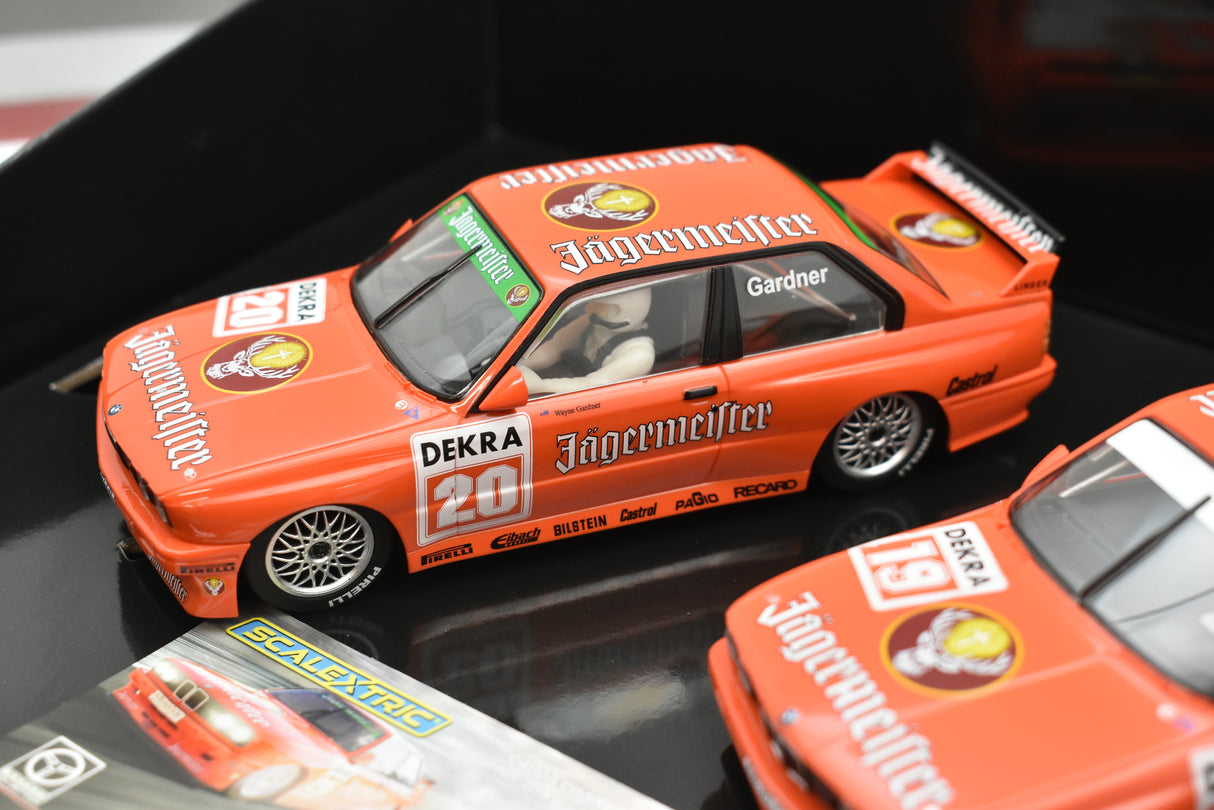 Orange slot cars: BMW E30 M3 in Jagermeister livery for Scalextric C4110A