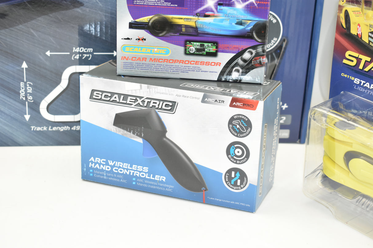 Remote control for model car racing, showing hand controller and track set for Bundle Pack Special C1404T