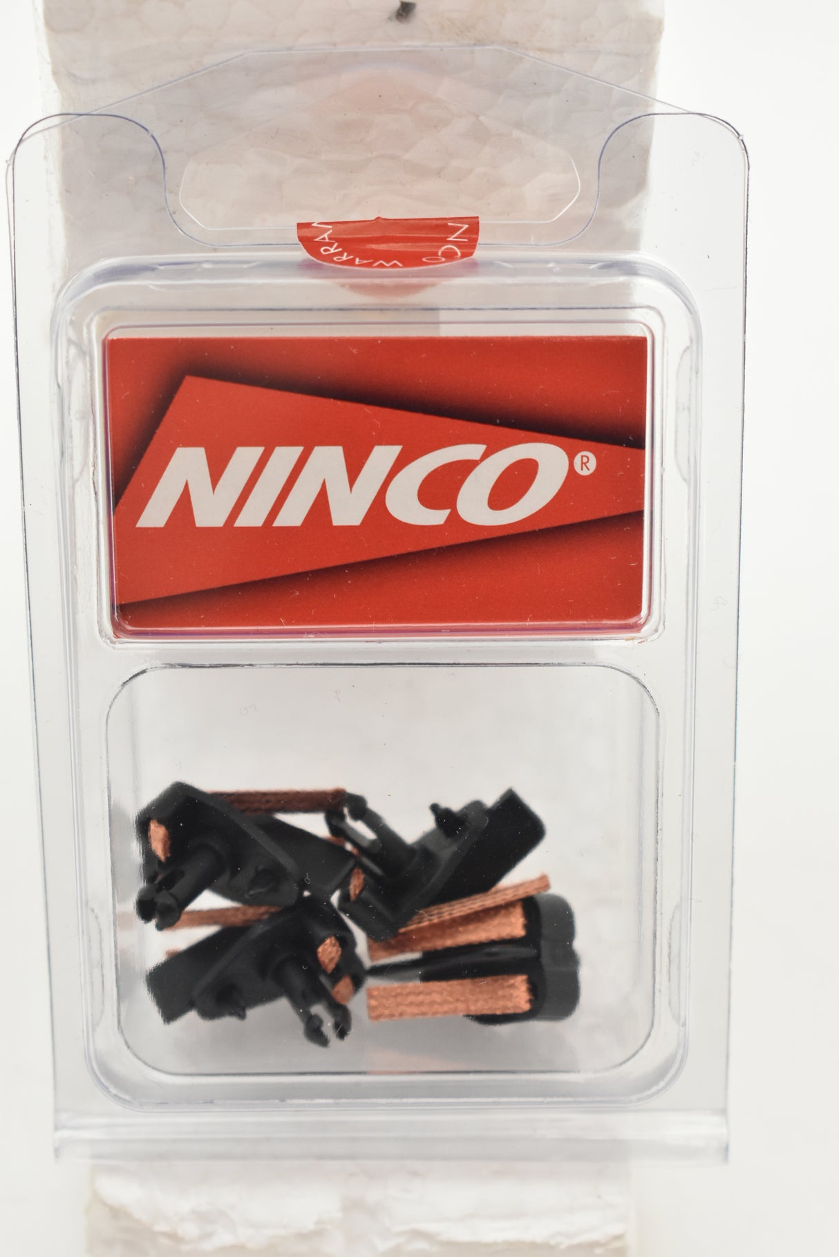 Black braided steering pins in clear plastic packaging for Ninco Steering 80105