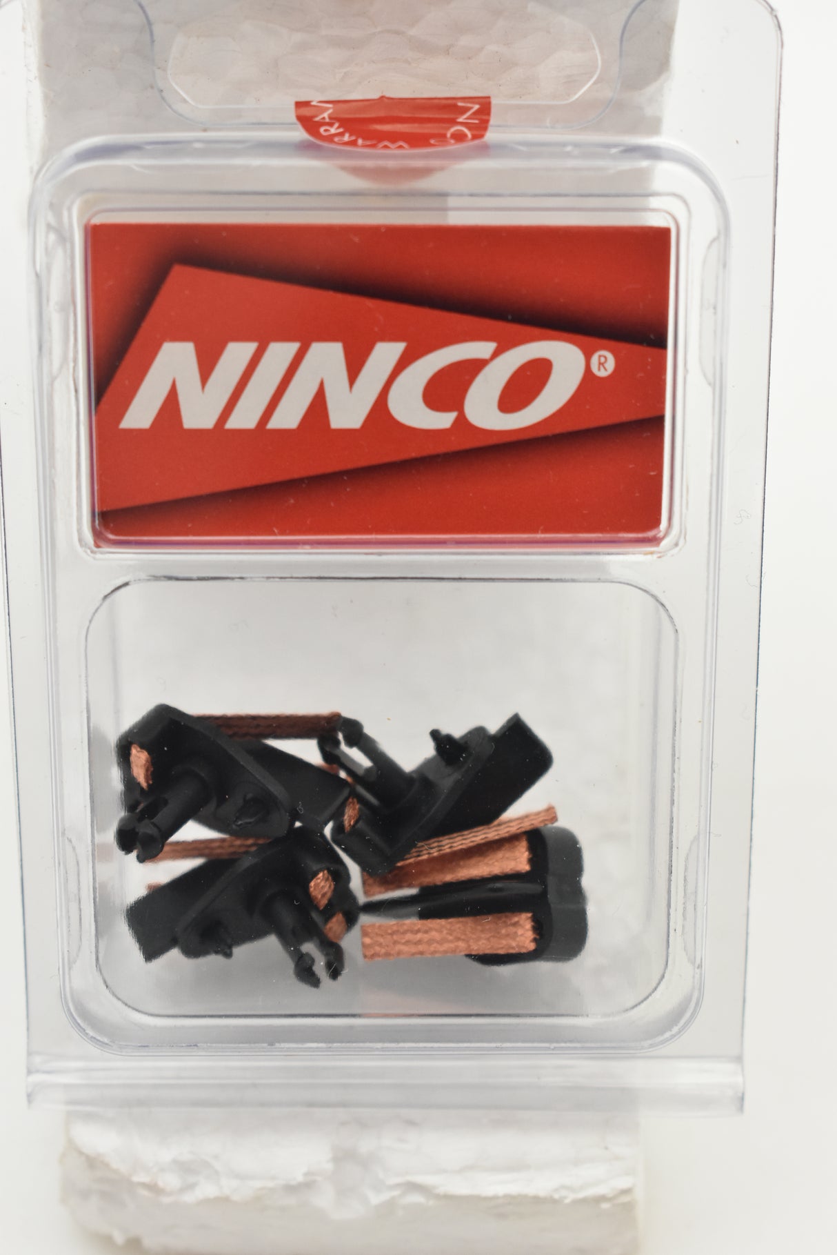 Black and copper braided steering pins in a clear plastic case for Ninco Steering 80105