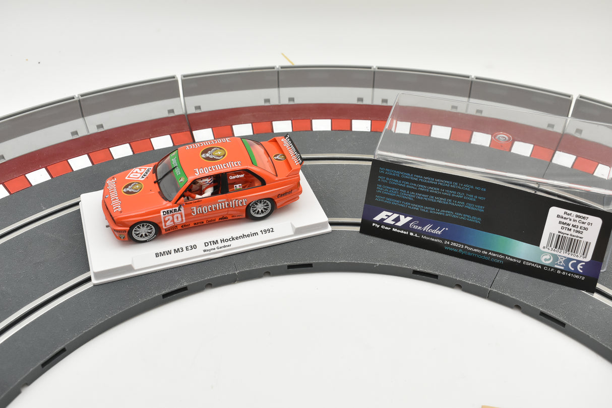 Orange BMW M3 E30 race car on a track section with product details for Fly Car Biker’s In Car 01