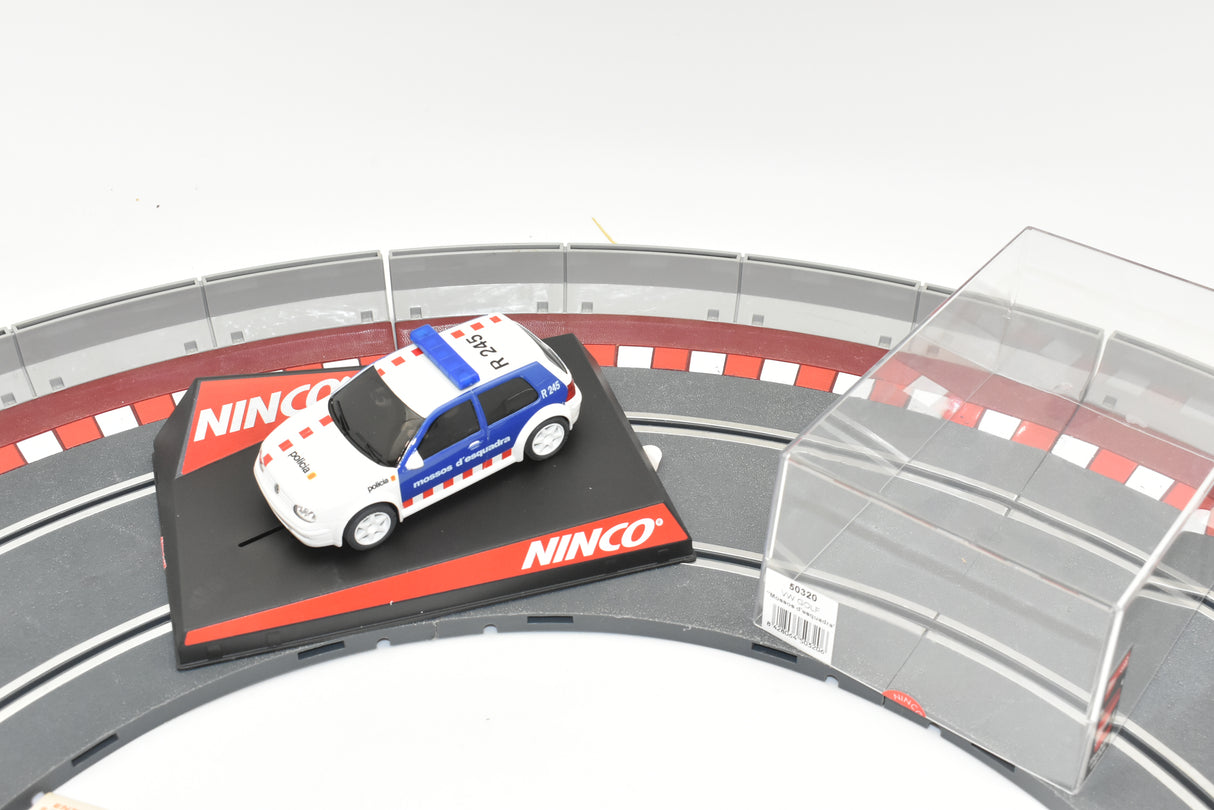 VW Golf race car on a track section for Ninco 50320