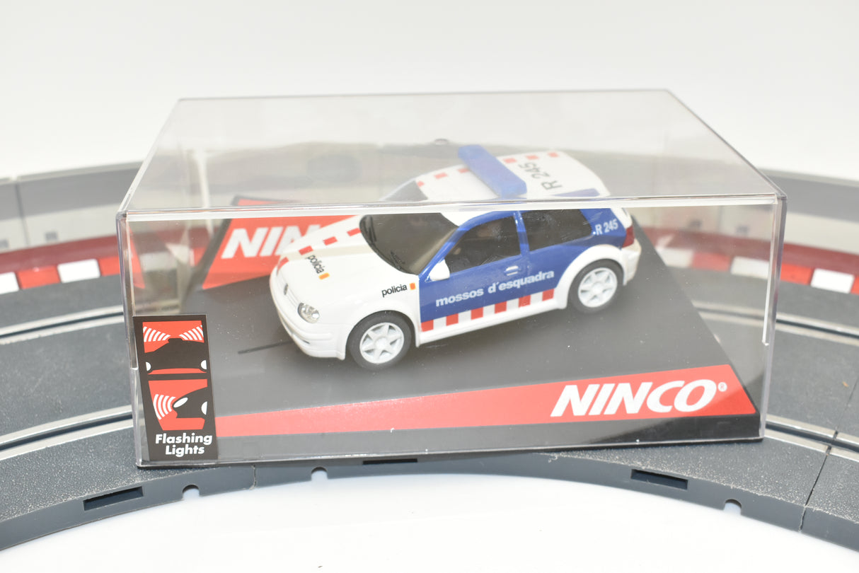 VW Golf police car in clear display case on track base for Ninco 50320