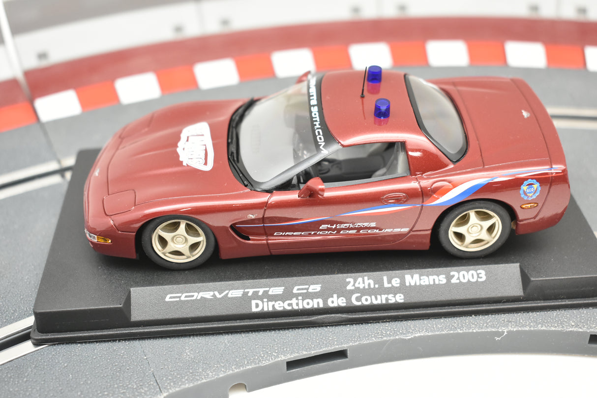 Red Corvette C5 race car model on a display base for Fly Car 88072