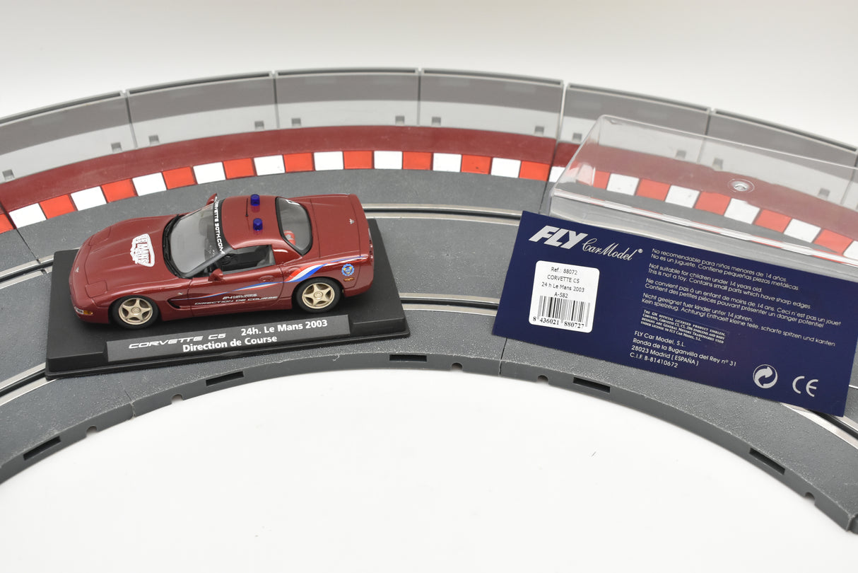 Red Corvette race car model on a track section for Fly Car 88072
