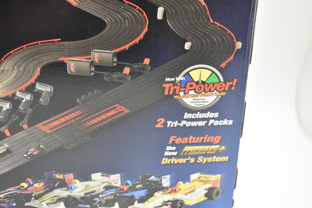 Race track layout and race cars for a model car set for AFX/ 21018