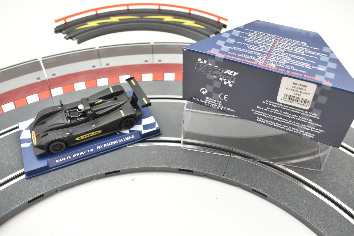 Race car model on track with product box for Fly Car 07059