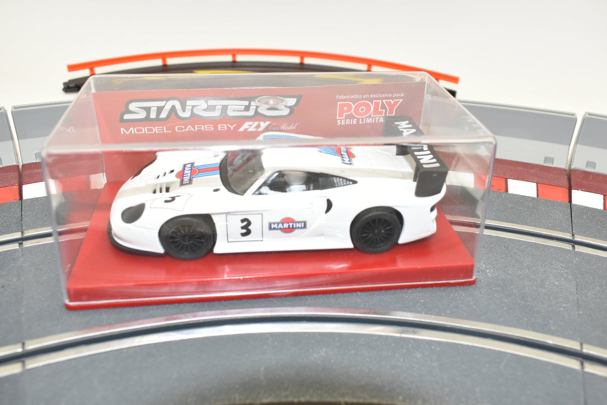 White model car with Martini livery on a red display base for Fly Car 87002