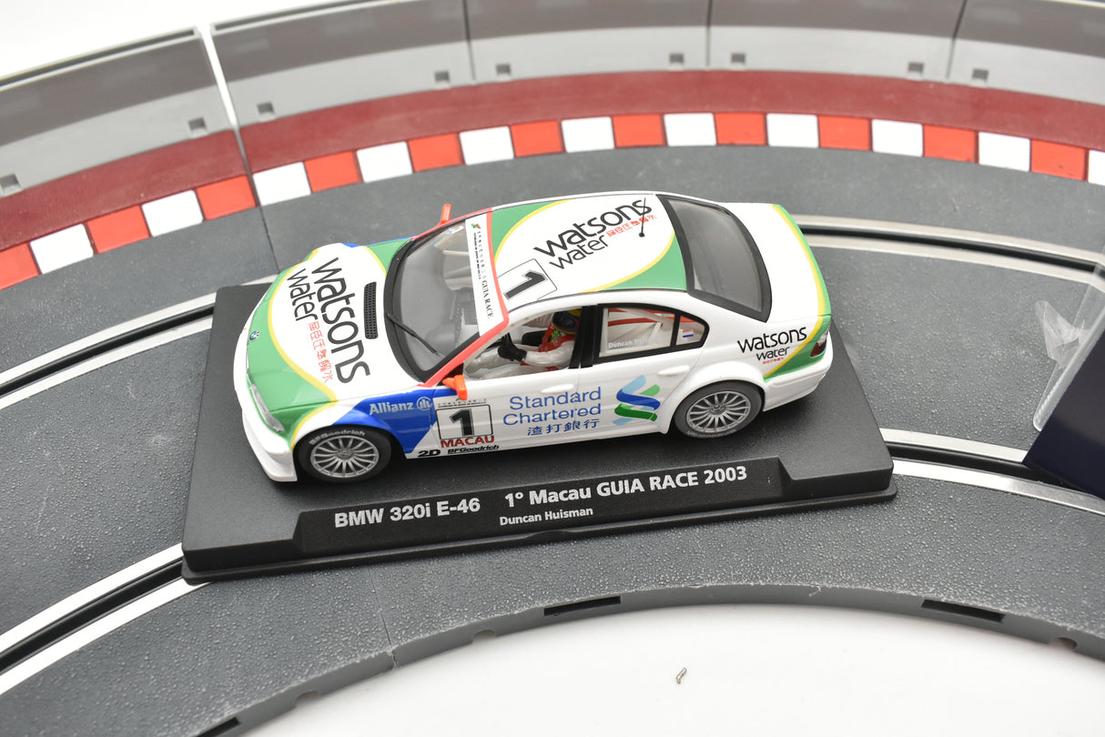 Slot car of a 2003 BMW 320i E-46 race car on a track for Fly Car 88107