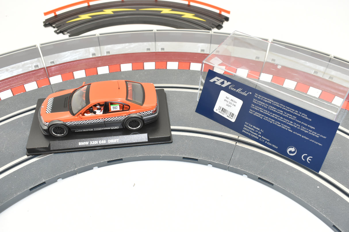 Orange BMW 320i E46 drift car on a track section for Fly Car 88254