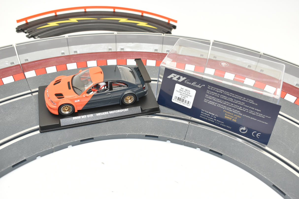Orange BMW M3 GTR race car on a track section for Fly Car E-280