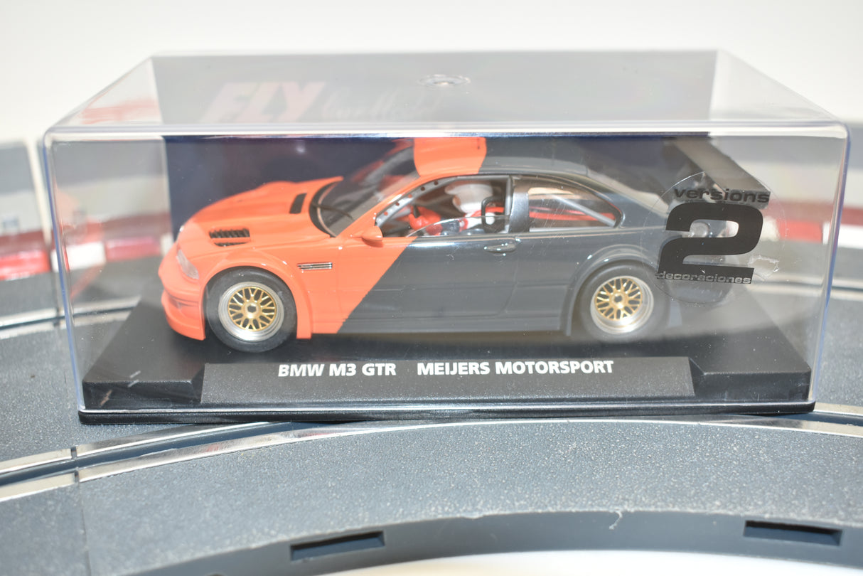 Orange BMW M3 GTR slot car in clear display case for Fly Car E-280