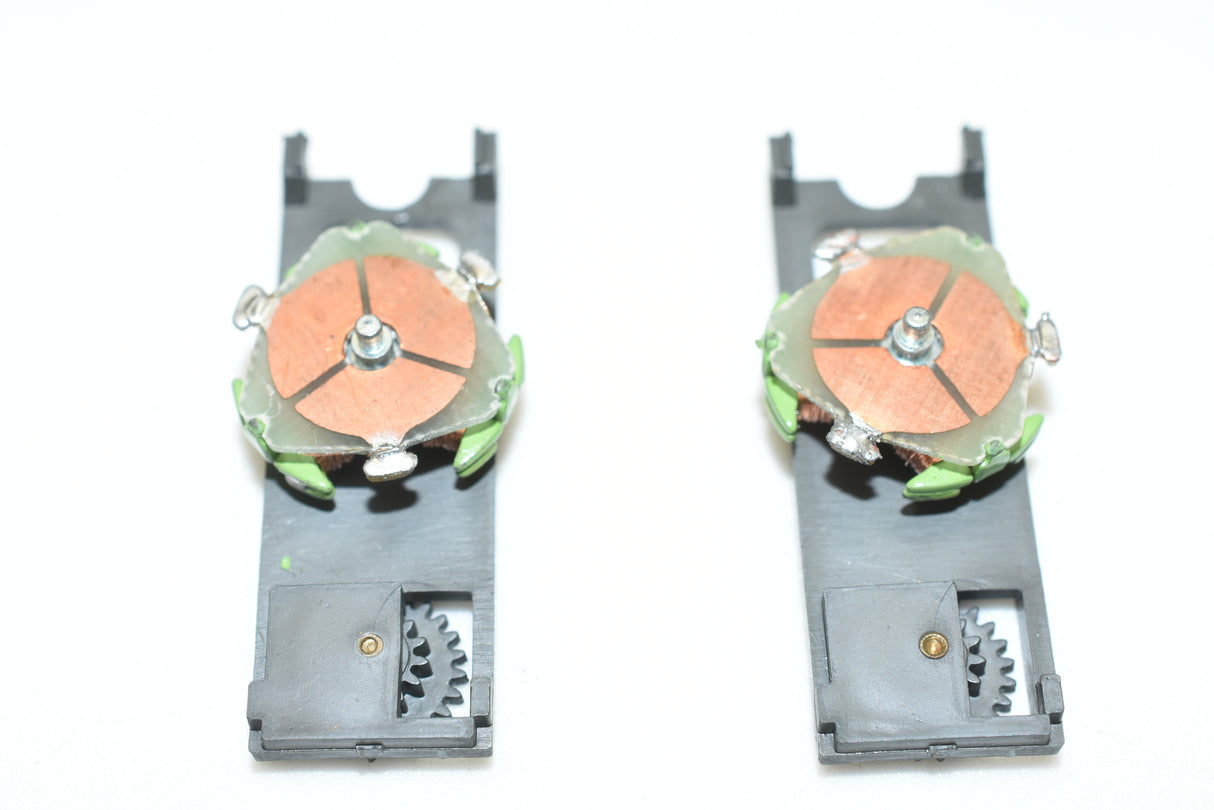 Two green and copper top plate assemblies for a toy vehicle for Aurora AFX 1750-061