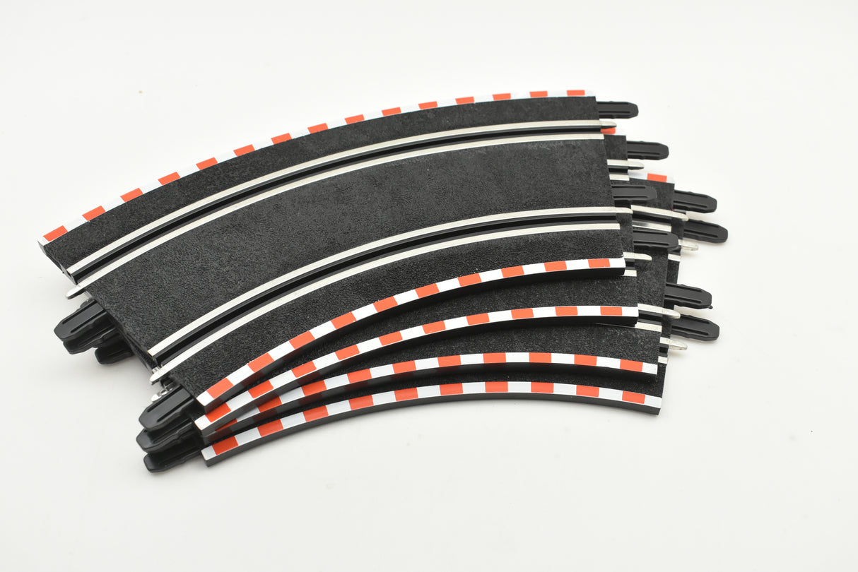 Curved track pieces for model railroading, showing various degrees of curve for SCX Compact SC-01.023
