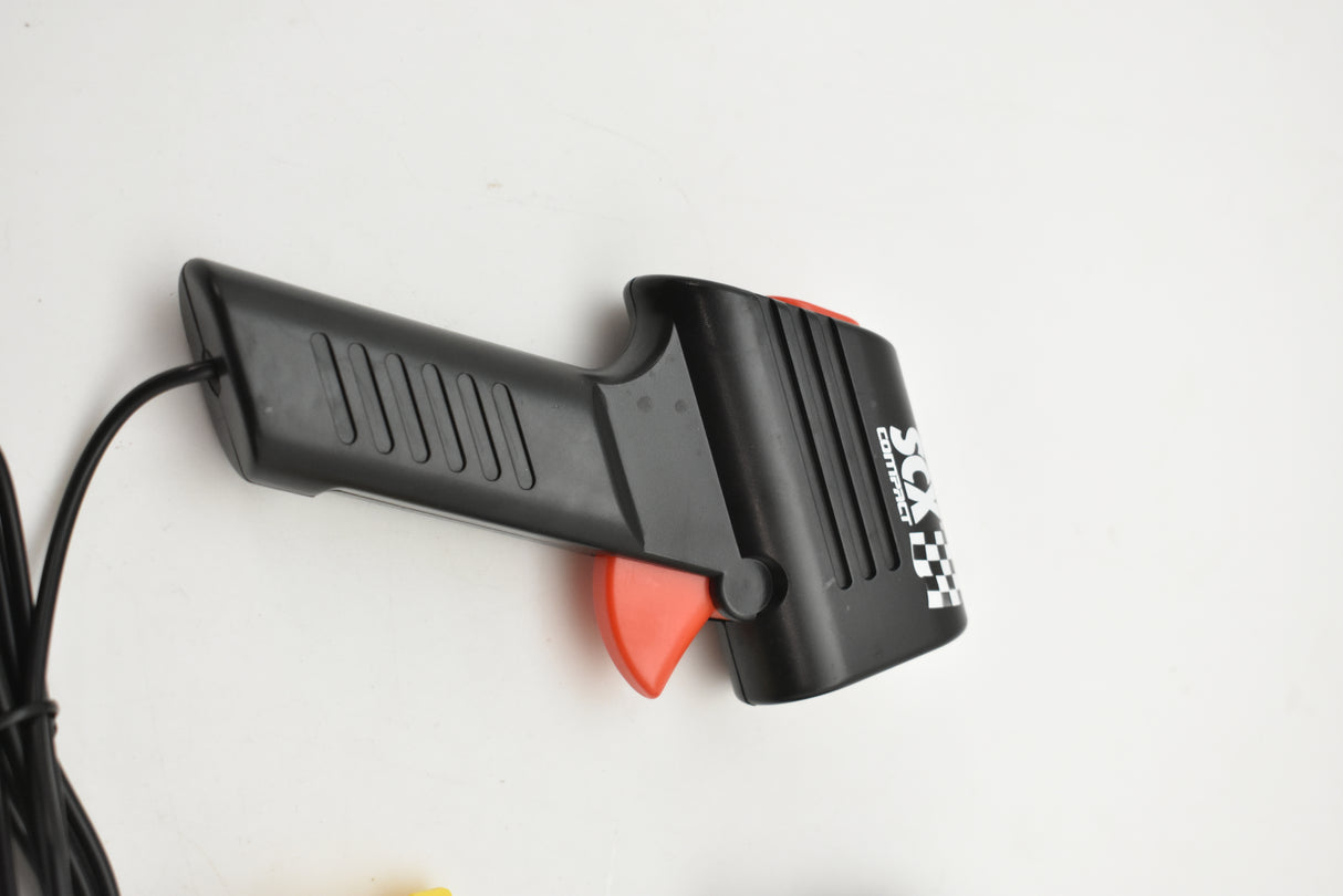 Black and red hand throttle with a cable attached for SCX Compact SP2009-007