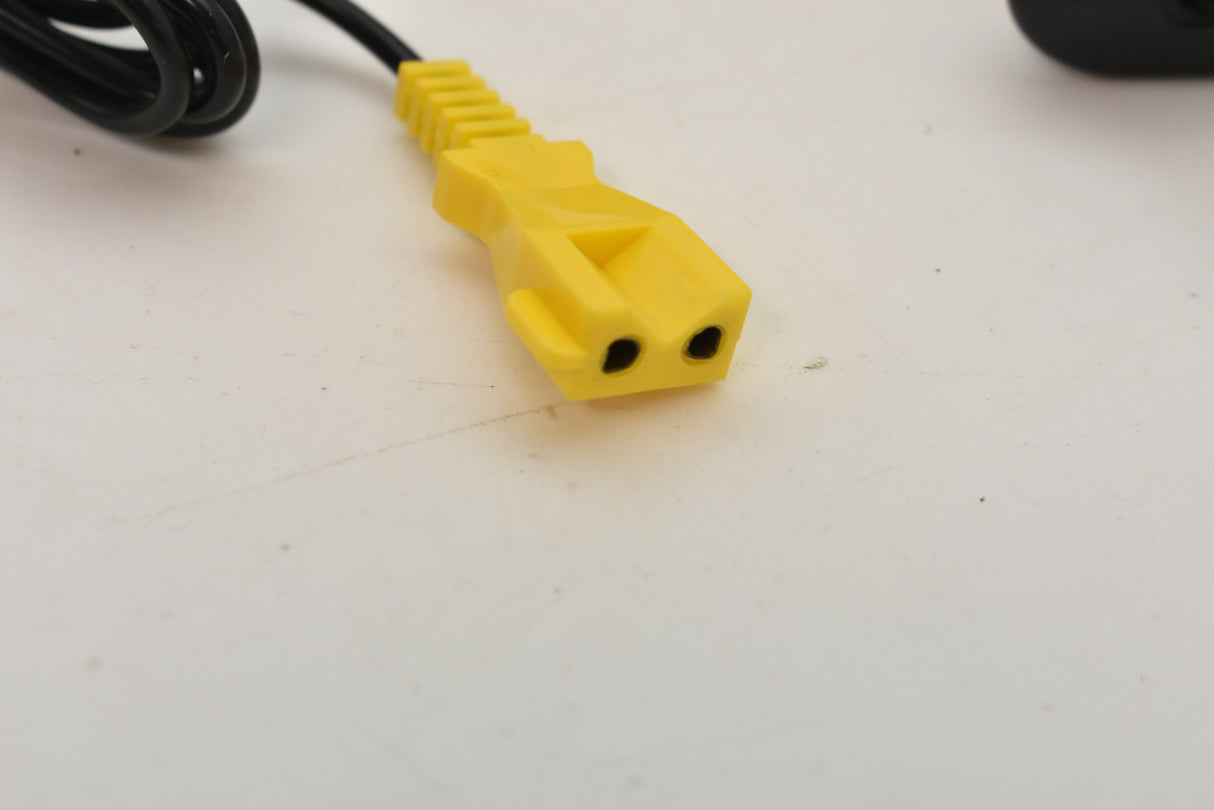 Yellow connector plug attached to a black cable for SCX Compact SP2009-007