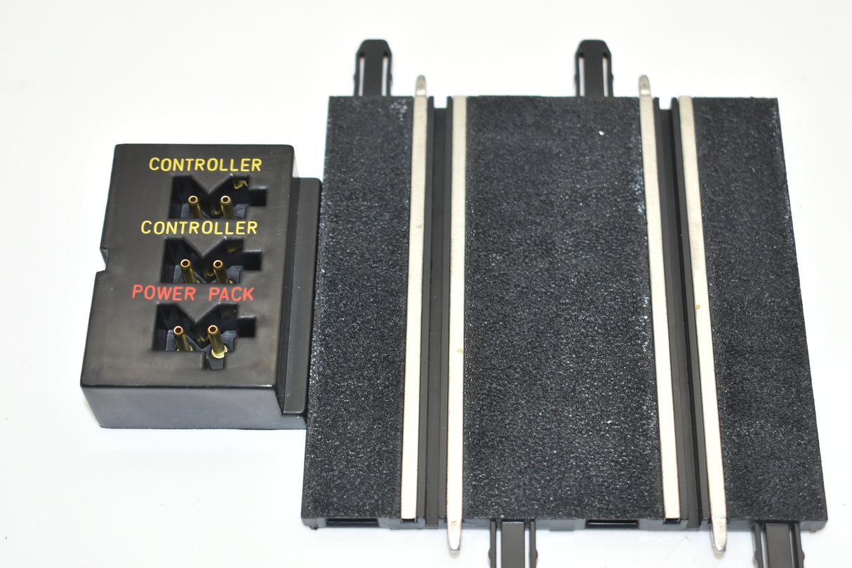 Terminal track connector with labeled controller and power pack sections for SCX Compact SC-01.052