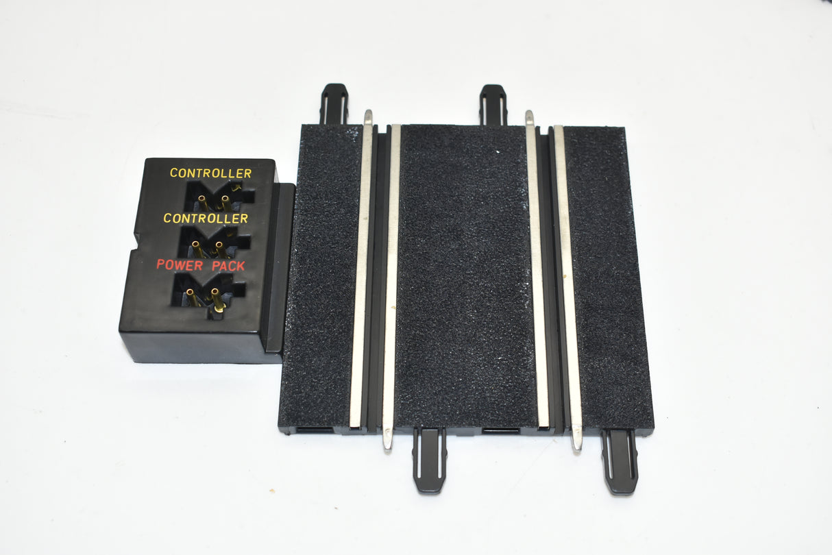 Terminal track with attached controller and power pack components for SCX Compact SC-01.052
