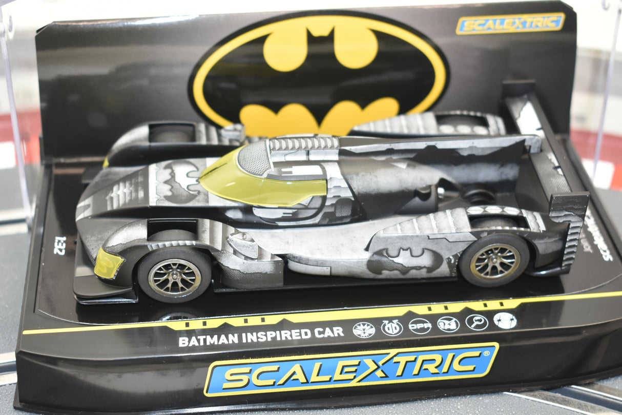 Black and yellow Batman-themed slot car in its box for Scalextric C4140