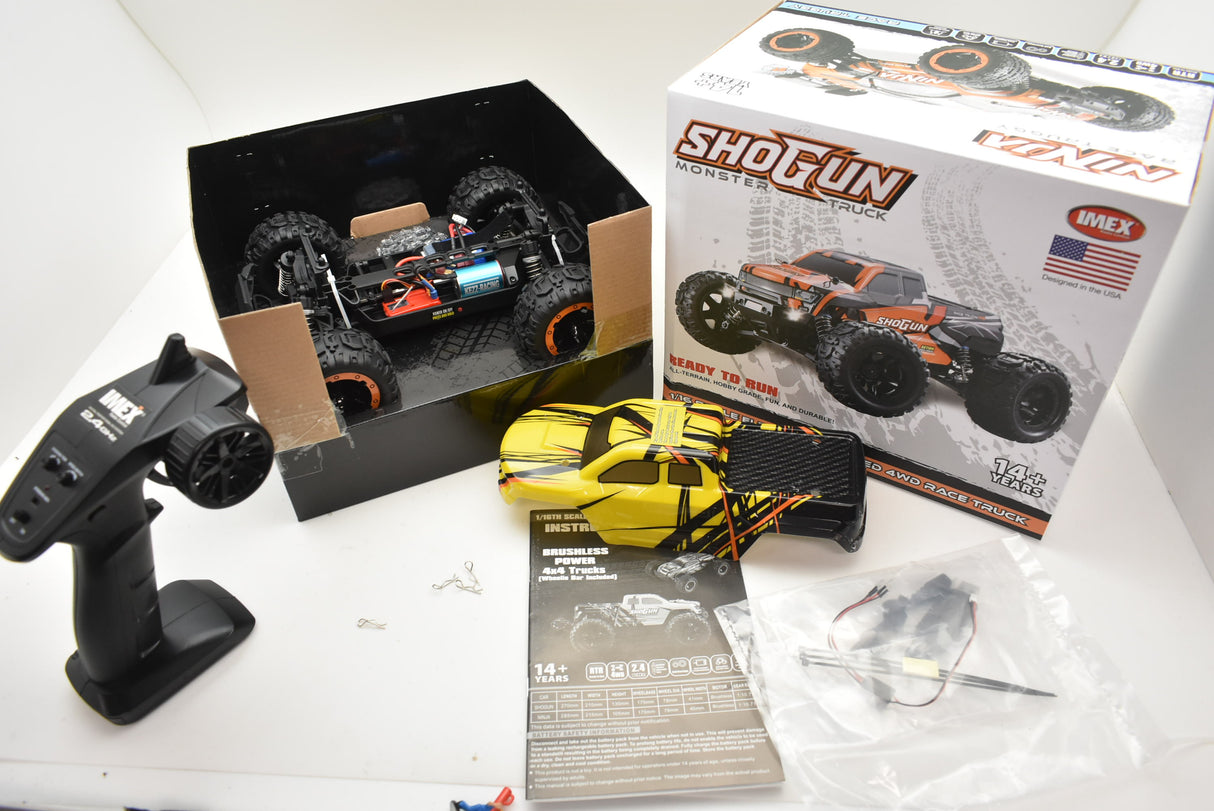 Yellow and black remote-controlled monster truck on a white surface for Blue/Yellow IMX19015