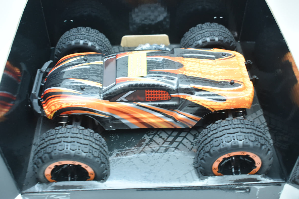 Orange and black monster truck with large tires, viewed from above for IMEX IMX19020