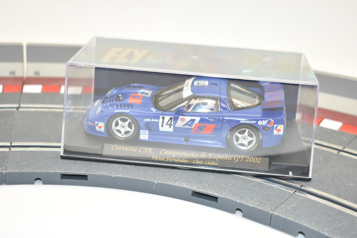 Blue Corvette C5R race car model on a track section for Fly Car A128