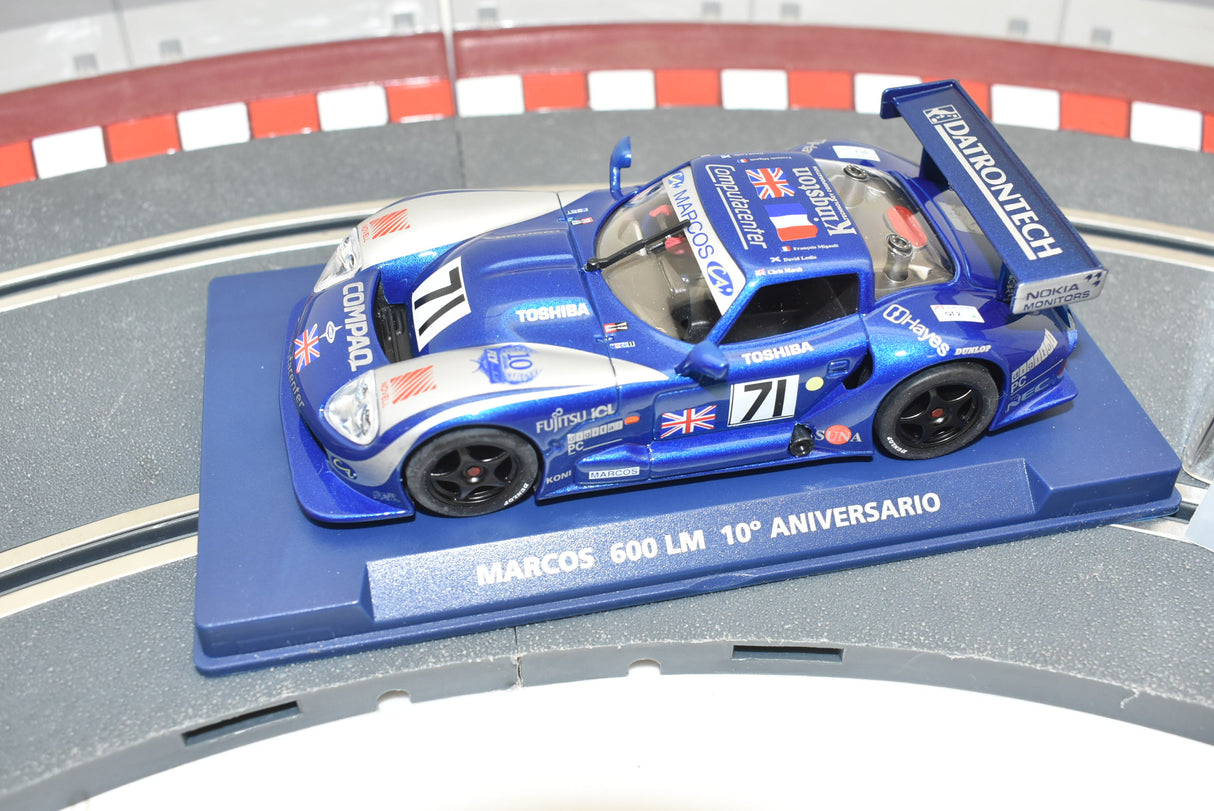 Blue race car model on a track base, commemorating the 10th anniversary for Fly Car 10 Anicersario