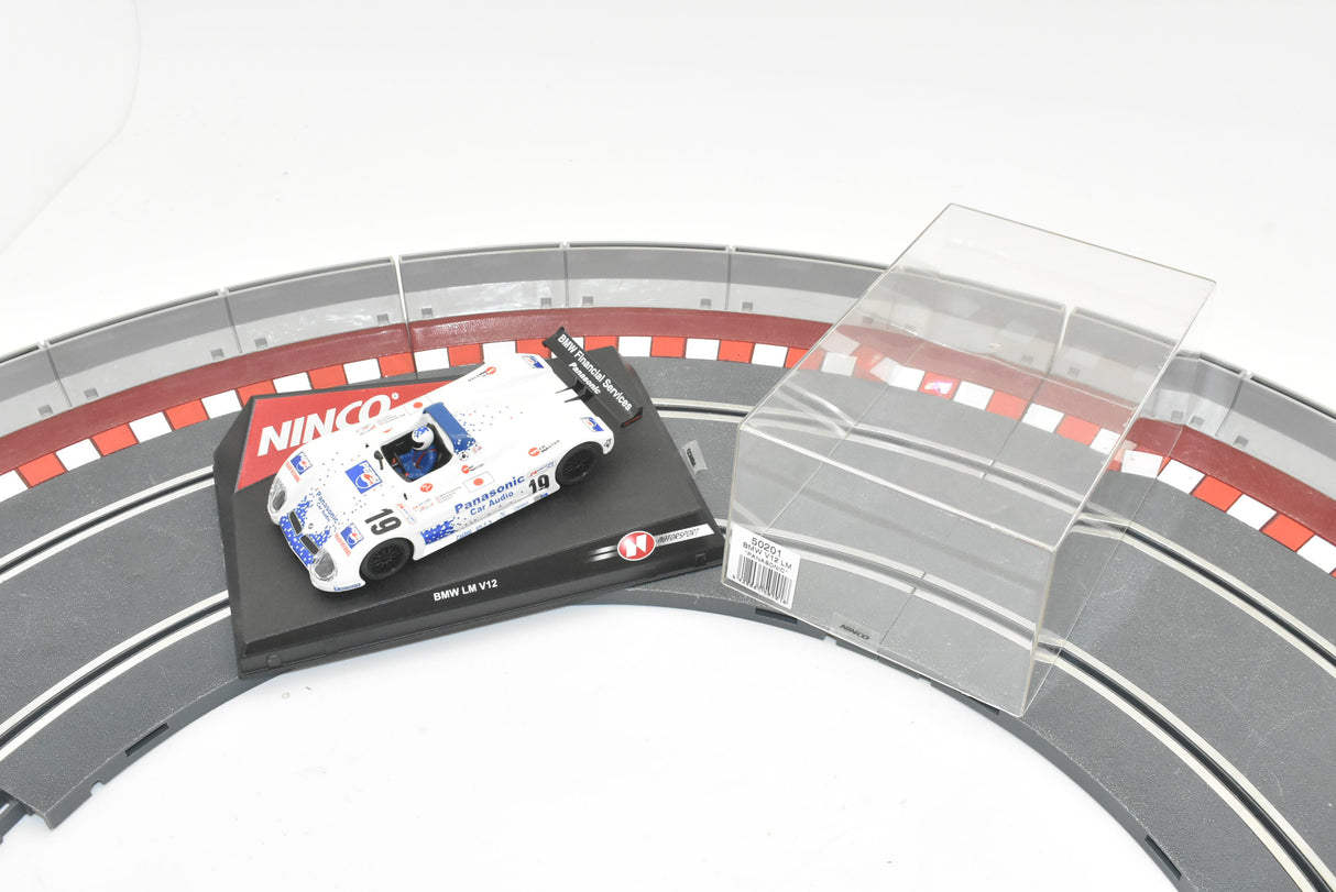 Slot car BMW V12 LM race car on a track section for Ninco 50201