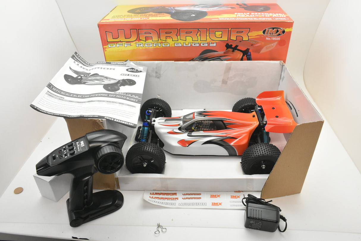 RC buggy kit with controller, manual, and box for IMEX 18020