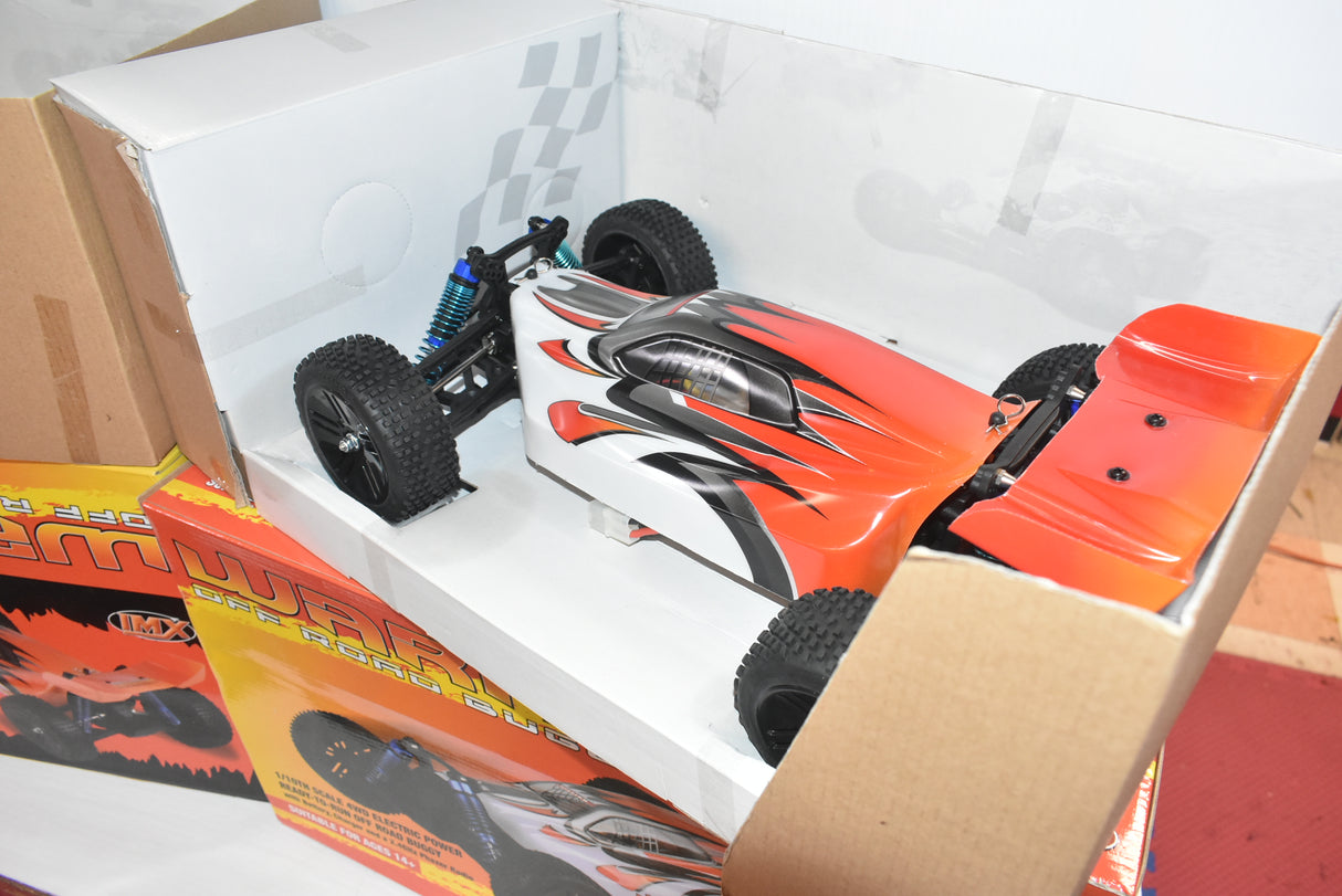 Remote control buggy on a white box, ready for action for IMEX 18020