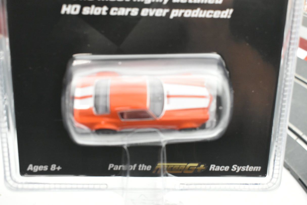 Orange Camaro SS396 slot car in clear plastic packaging for AFX/Racemasters 22027 / 21005
