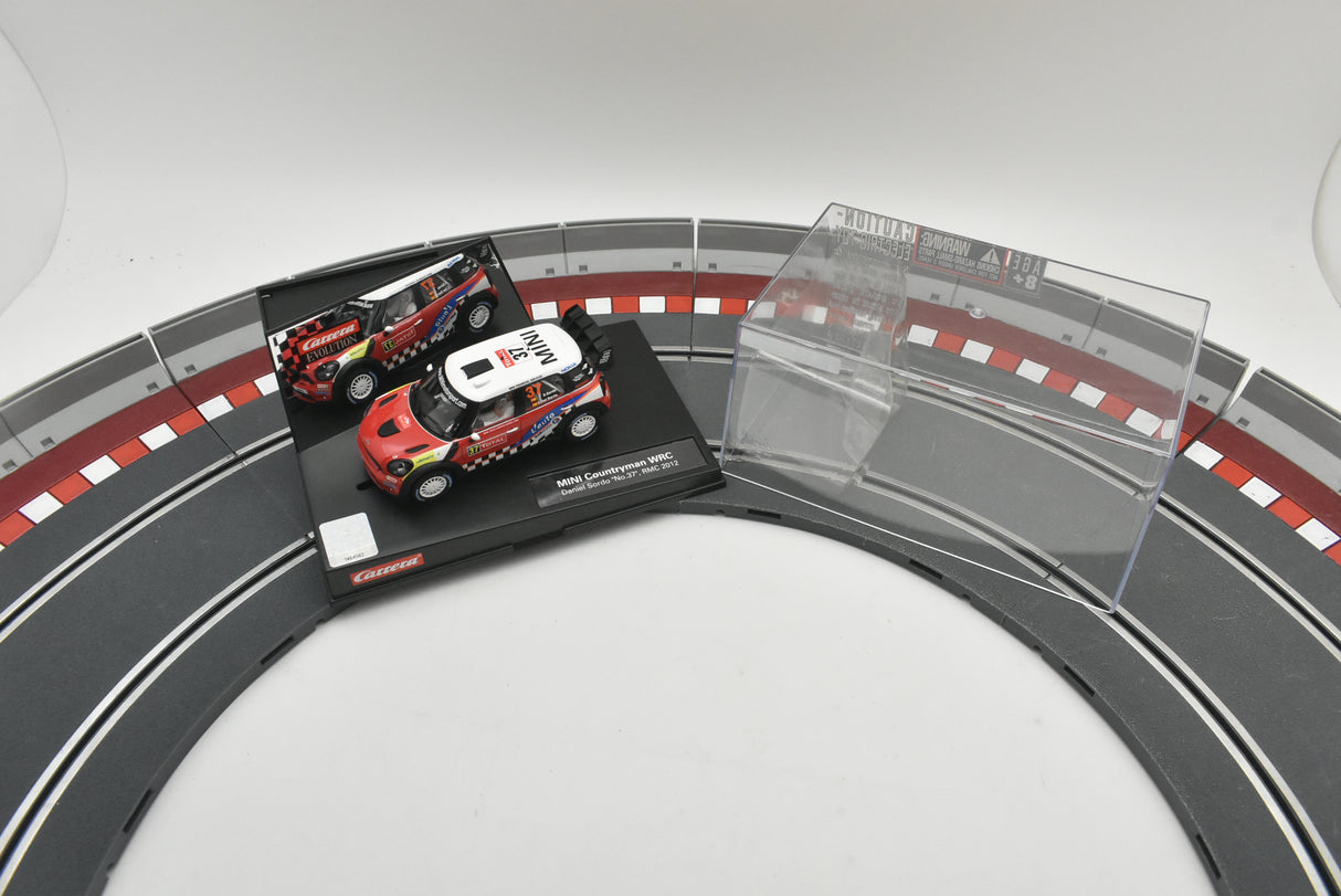 Race car track with two Mini Countryman WRC race cars on the track for Carrera Evolution 27405