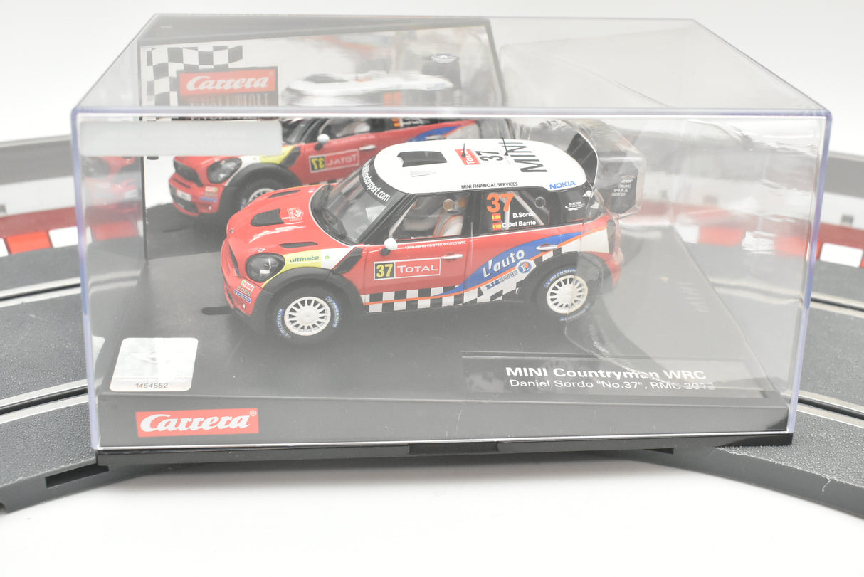 Miniature race car display box featuring a Mini Countryman WRC model for Carrera Evolution 27405