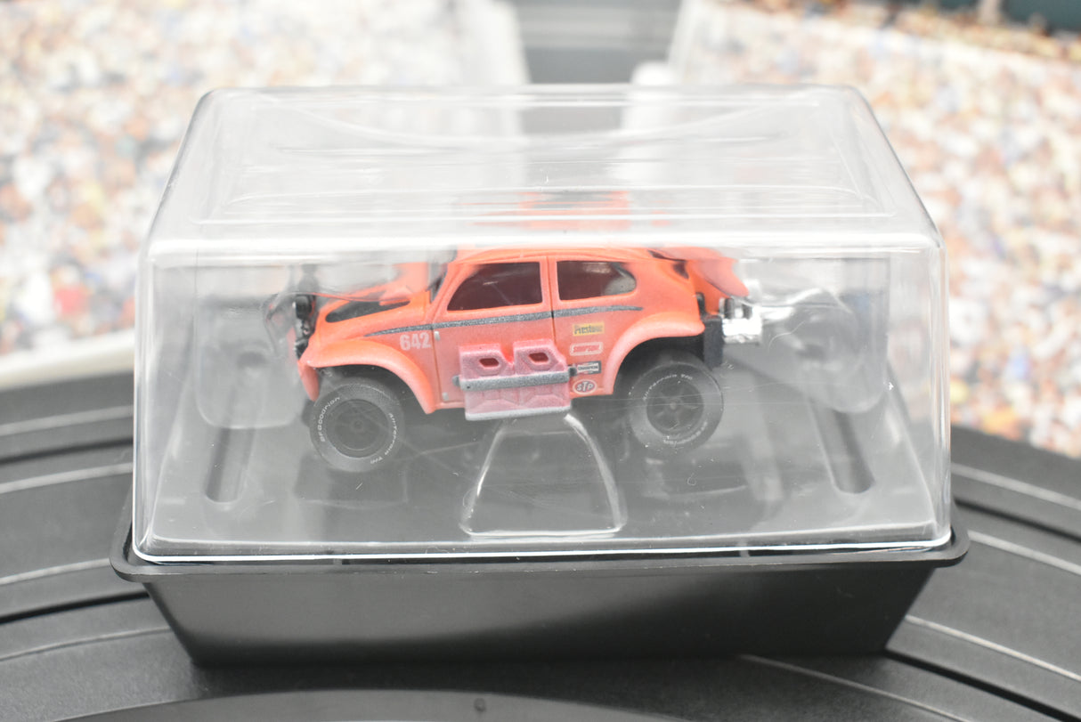 Orange VW Beetle toy car in clear plastic display case for Auto World SC011