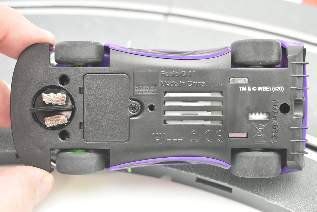 Black and purple electronic component with visible wiring and markings for Scalextric C4142T