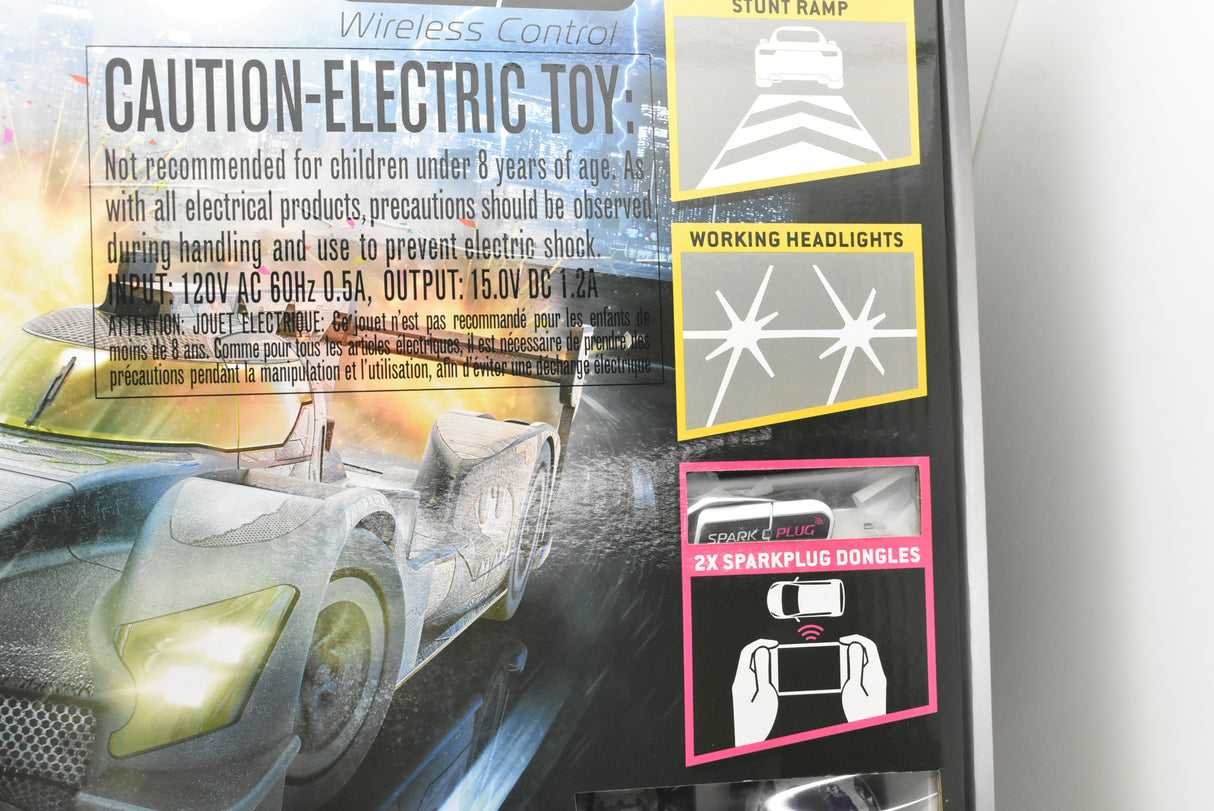 Warning labels and product features for a remote-controlled toy set for Scalextric C415