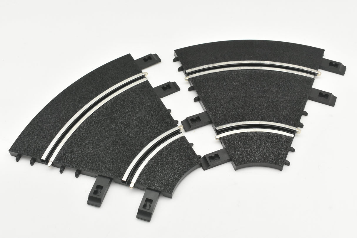 Two black model train track curves for laying track for Ninco 10106