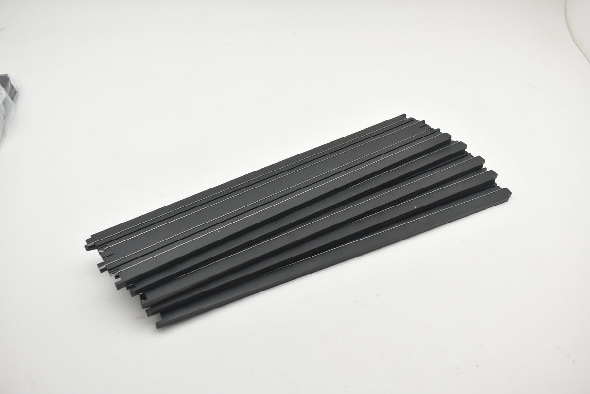 Assortment of black straight track pieces for model train layout for Auto World H0045, alternate track view